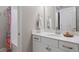 Clean bathroom with white subway tile, a bathtub, and a vanity with a white countertop at 23890 E Minnow Dr, Aurora, CO 80016