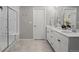 Spa-like bathroom with double vanity and a separate shower at 23890 E Minnow Dr, Aurora, CO 80016