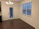Bright dining area with hardwood floors and access to a patio at 4630 Copeland Cir # 102, Highlands Ranch, CO 80126