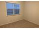 Bright bedroom with neutral carpeting and window blinds at 4630 Copeland Cir # 102, Highlands Ranch, CO 80126