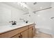 Modern bathroom with double vanity and bathtub at 1381 Zenith Heights Ct, Erie, CO 80516