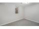 Bright, spacious basement bedroom with carpet and window at 6035 Everett St, Arvada, CO 80004