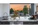 Kitchen with granite countertop and view of rooftop deck at 3362 W 32Nd Ave, Denver, CO 80211