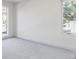 Bright bedroom with neutral carpeting and large windows at 3362 W 32Nd Ave, Denver, CO 80211