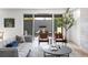 Living room with sliding glass doors leading to a patio at 3362 W 32Nd Ave, Denver, CO 80211