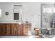 Modern bathroom with wood vanity and walk-in shower at 3362 W 32Nd Ave, Denver, CO 80211