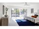 Main bedroom with sliding glass doors leading to a balcony at 3362 W 32Nd Ave, Denver, CO 80211