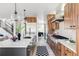 Modern kitchen with stainless steel appliances and an island at 3362 W 32Nd Ave, Denver, CO 80211