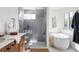 Spa-like bathroom with a freestanding tub and walk-in shower at 3362 W 32Nd Ave, Denver, CO 80211