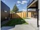 Spacious backyard with grassy area and concrete patio at 3362 W 32Nd Ave, Denver, CO 80211