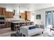 Modern kitchen with wood cabinets and a large island at 3362 W 32Nd Ave, Denver, CO 80211