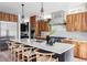 Modern kitchen with wood cabinets, stainless steel appliances, and an island at 3362 W 32Nd Ave, Denver, CO 80211