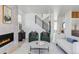 Bright living room with fireplace and a view of the staircase at 3362 W 32Nd Ave, Denver, CO 80211