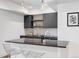 Sleek basement wet bar, perfect for entertaining at 3362 W 32Nd Ave, Denver, CO 80211