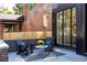 Brick patio with seating area and view of neighboring building at 3362 W 32Nd Ave, Denver, CO 80211
