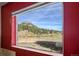 Scenic mountain view seen from the living room window at 2677 S Platte River Rd, Sedalia, CO 80135