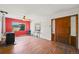 Living room features wood floors, wood burning stove, and a view at 2677 S Platte River Rd, Sedalia, CO 80135