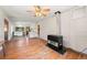 Open concept living room with kitchen and wood burning stove at 2677 S Platte River Rd, Sedalia, CO 80135