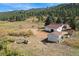 Aerial view of property, showing home, shed, and river access at 2677 S Platte River Rd, Sedalia, CO 80135