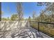 Modern deck with metal railing and treetop views at 3212 S Dahlia St, Denver, CO 80222
