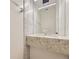 Contemporary bathroom with a floating vanity and geometric patterned tile at 3212 S Dahlia St, Denver, CO 80222