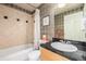 Clean bathroom with tub and shower at 1747 N Washington St # C306, Denver, CO 80203