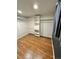 Spacious walk-in closet with built-in shelving and hanging rods at 3480 W 96Th Ave, Westminster, CO 80031