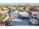 Backyard view of the house with a covered patio and shed at 737 S 10Th Ave, Brighton, CO 80601