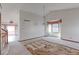 Dining area with vaulted ceilings, chandelier lighting, and carpeted flooring at 2552 E 126Th Way, Thornton, CO 80241