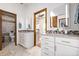 Double vanity bathroom with separate toilet and shower at 1324 Shadow Mountain Dr, Highlands Ranch, CO 80126