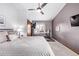 Spacious bedroom with vaulted ceilings and a home office area at 1324 Shadow Mountain Dr, Highlands Ranch, CO 80126