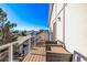 Deck with seating area and scenic neighborhood views at 1324 Shadow Mountain Dr, Highlands Ranch, CO 80126