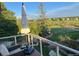 Deck overlooking a beautifully landscaped backyard and neighborhood at 1324 Shadow Mountain Dr, Highlands Ranch, CO 80126