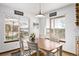 Bright dining area with large windows offering scenic views at 1324 Shadow Mountain Dr, Highlands Ranch, CO 80126