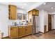 Kitchen features updated cabinetry, a large sink, and stainless steel appliances at 1324 Shadow Mountain Dr, Highlands Ranch, CO 80126