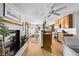 Kitchen boasts modern cabinetry, stainless steel appliances, and a breakfast bar at 1324 Shadow Mountain Dr, Highlands Ranch, CO 80126