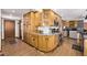 Well-equipped kitchen with ample cabinetry and granite countertops at 1324 Shadow Mountain Dr, Highlands Ranch, CO 80126