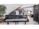 A Kawai grand piano sits in a sunlit living room at 1324 Shadow Mountain Dr, Highlands Ranch, CO 80126