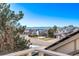 Residential neighborhood view with mountains in the distance at 1324 Shadow Mountain Dr, Highlands Ranch, CO 80126