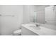 Clean bathroom with white vanity, shower/tub combo and tile flooring at 18235 Caffey Dr, Parker, CO 80134