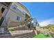 Townhouse exterior with private stairs and landscaping at 347 Felicity Loop, Castle Rock, CO 80109