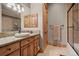 Basement bathroom with granite countertop and shower at 1420 Sierra Dr, Boulder, CO 80302