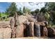 Multi-tiered waterfall feature in a rock garden setting at 1420 Sierra Dr, Boulder, CO 80302