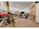 Well-equipped home gym with various exercise machines and mirrors at 1420 Sierra Dr, Boulder, CO 80302