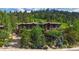 Mountain view home with stonework landscaping and large windows at 1420 Sierra Dr, Boulder, CO 80302