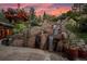 Waterfall cascades over rocks in a landscaped setting at 1420 Sierra Dr, Boulder, CO 80302