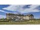 Large hotel with pool and outdoor seating area at 3909 N Shawnee St, Aurora, CO 80019