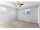 Bright bedroom with neutral walls and carpet at 8286 E Girard Ave, Denver, CO 80231