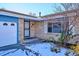 House entrance with a brick facade and a small landscaped front yard at 8286 E Girard Ave, Denver, CO 80231