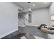 Finished basement with exercise equipment and stairs at 2311 Decatur St, Denver, CO 80211